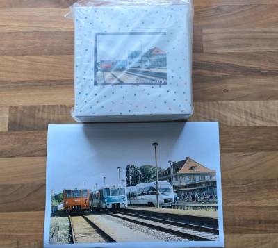 Puzzle mit dem Motiv von 3 Zügen am Bahnhof Jerichow